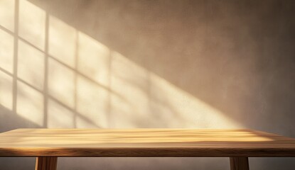 Empty wooden table, sunlit shadow play