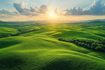 Wind turbines towering over a green field.