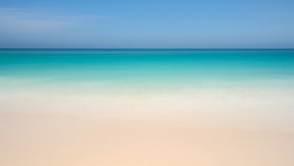 Serene Coastal Landscape Blurred Motion of Ocean Waves and Sandy Beach