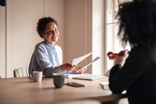 Professional Job Interview Between Two Women in Modern Office Setting