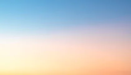 Colorful sky background showing a gradient from blue to orange at sunset © CreativeSuburb