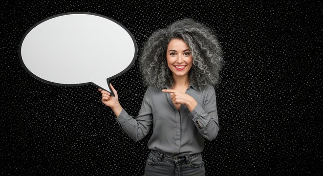 The woman is holding a large white speech bubble. Visual Concept.
