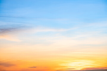 Sky,sunset, beautiful , luxury soft gradient orange gold clouds and sunlight on the blue sky perfect for the background, Sunrise on morning or everning in winter warm time ,Twilight summer,silhouette