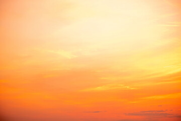 Sky,sunset, beautiful , luxury soft gradient orange gold clouds and sunlight on the blue sky perfect for the background, Sunrise on morning or everning in winter warm time ,Twilight summer,silhouette