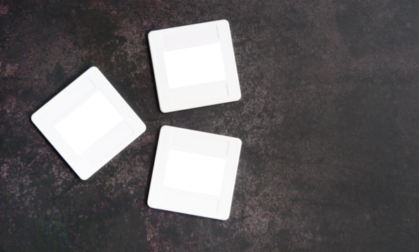 White Plastic Slide Frame Mount for slide film, transparent cutout isolated mock up template, Retro element, nostalgia, photograh, film camera in dark background