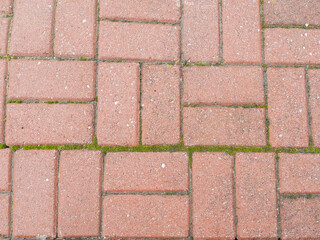 Old red pavement stone texture as background