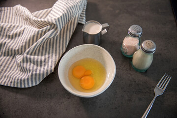 Making an omelette at home in the kitchen on the countertop