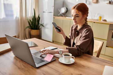 Engaging red haired woman working from home with coffee on a sunny afternoon