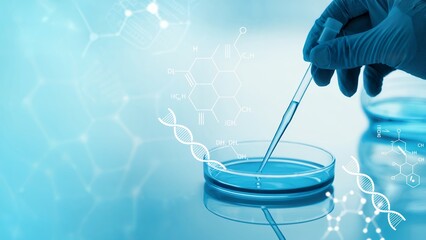 Close-up of gloved hand using pipette to add liquid into petri dish, a concept for medical research, science, and biotechnology