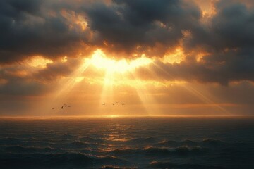 Obraz premium Golden sunlight breaking through dramatic dark clouds over a vast ocean with gentle waves and flying birds, evoking a serene and hopeful mood