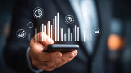 Businessman Holding Smartphone with Data Analytics and Financial Graphs in Background for Digital Marketing and Technology Concepts