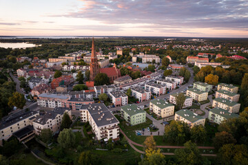Obraz premium Szczecin Dąbie: Aerial View of Cityscape at Sunset