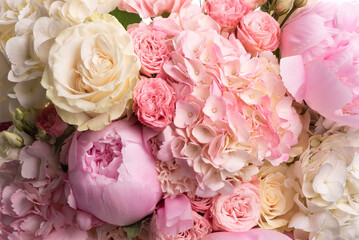 Luxurious bouquet of pink and white peonies, roses, hydrangeas and Asian buttercups. Congratulations
