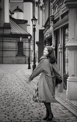 young beautiful woman in vintage suit in european city