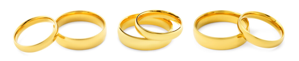 Shiny golden wedding rings on white background, set