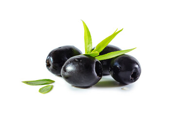 Ripe black olives with leaves on white background.