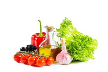 Olive oil, cherry tomatoes, bell pepper, olives, garlic and frillice lettuce leaves.