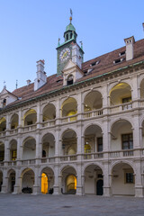 Historic courtyard features beautiful architecture in Graz Austria at twilight