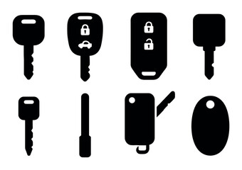 Various silhouettes of car and door keys on white background