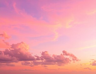 Naklejka premium A breathtaking sunset paints the sky in vibrant shades of pink, blending with soft orange and purple hues, creating a serene and magical atmosphere.