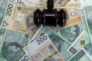 gavel hammer on polish loty zl pln money. Corruption concept