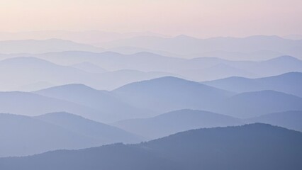 Obraz premium Layered mountain range with cool tone and peaceful mood.
