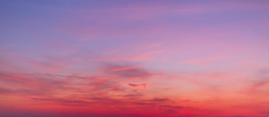 colorful clouds and sky,Dusk, Sunset Sky Clouds in the Evening with colorful Orange, Yellow, Pink and red sunlight and Dramatic storm clouds on Twilight sky, Landscape horizon