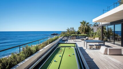 oceanfront luxury home with bocce ball court