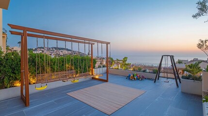 rooftop playground with ocean view at sunset