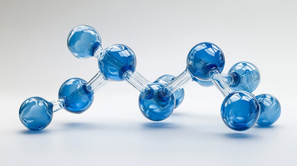 Reflective and refractive glass model of a molecule isolated on white background