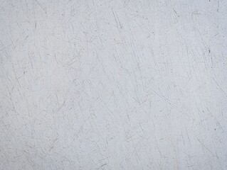 Obraz premium Detailed white surface with scratches and marks illustrating texture and imperfection.