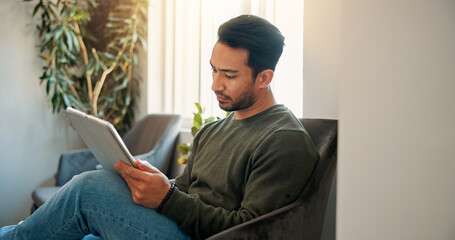 Appointment, sign in and tablet with man in lobby of office for personal information. Application, digital form and schedule with person in waiting room of spa for session, therapy or wellness