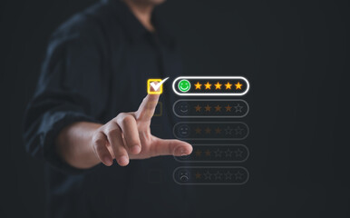 Businessman selecting a five-star rating with happy face icon on virtual interface, representing excellent customer experience, quality review, user satisfaction, feedback evaluation,business success