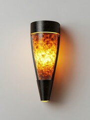 Modern wall sconce with amber glow illuminating a minimalist interior space