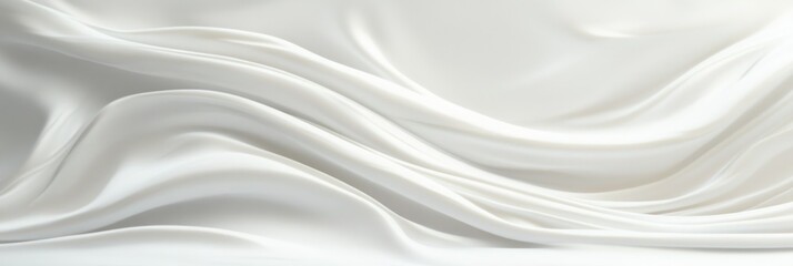 Obraz premium Smooth flowing white satin fabric with soft elegant folds and gentle curves creating a luxurious and calming texture