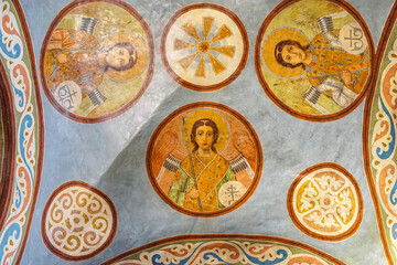 Beautiful fresco painting on the ancient orthodox church in Kyiv, Ukraine. Icons of angel and saints