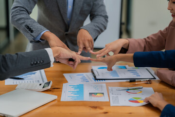 Close-up of business people shaking hands. Concept of unity and teamwork. Meeting about contract....