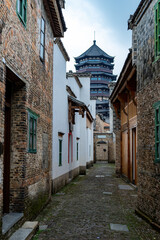 Ancient Chinese Alleyway with Pagoda in the Background