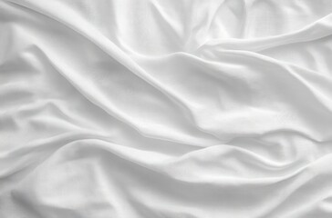 Naklejka premium Soft white fabric with gentle folds and creases creating a smooth, flowing texture