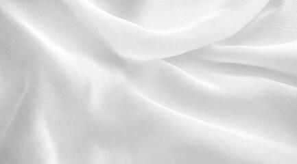 Close-up of soft, smooth white fabric with gentle folds and texture creating a delicate and calm visual effect