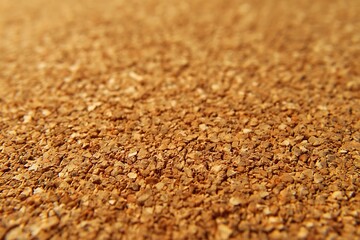 Close focus on compressed cork surface with light brown finish  
