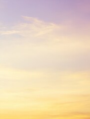 Soft Pastel Sunset Sky with Gradient Colors of Purple and Yellow Creating a Peaceful and Serene Natural Atmosphere for Relaxation and Reflection