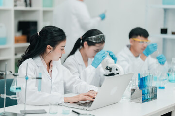 Fototapeta premium Medical research team conducting scientific experiments in a pharmaceutical laboratory, analyzing samples under microscopes to develop innovative medicine and healthcare solutions
