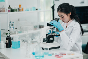 Microscope-focused research in modern laboratory environment, highlighting advancements in medicine technology, experimentation through the precision and dedication of scientist