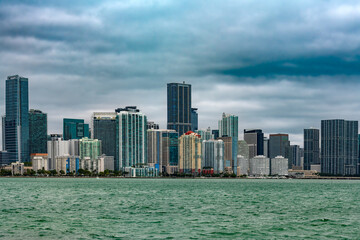 The skyline of downtown Miami showcases a dynamic mix of sleek office towers and modern apartment...