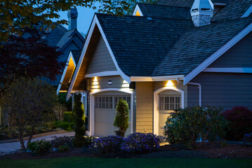 Garage door in luxury house with trees and nice landscape in Spring in Vancouver, Canada, North...