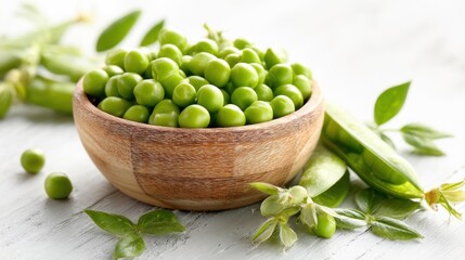 Fresh green peas in a wooden bowl (2)