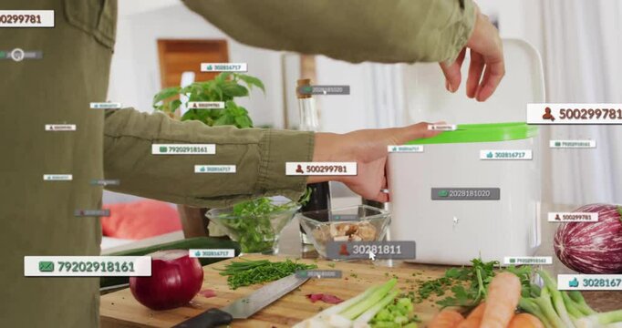 Woman placing lid on container in kitchen, showing food tech labels over chopped herbs and carrots