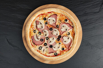 Ham, Mushroom & Olive Pizza – Classic pizza topped with ham, fresh mushrooms, and black olives. Captured on a dark stone background for a rich and elegant visual appeal.