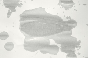 Wet spot on paper